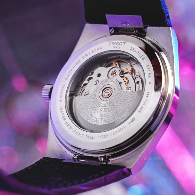 Căn chỉnh chốt lò xo để lắp dây Tissot mới